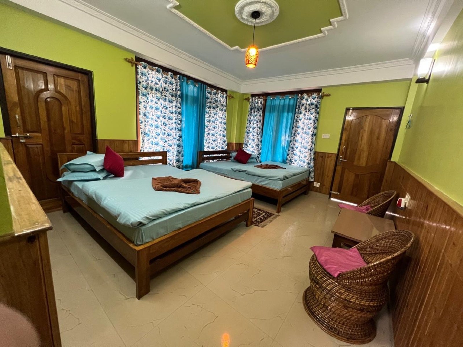 Four-bedded family room at Saino Heritage Bungalow in Takdah